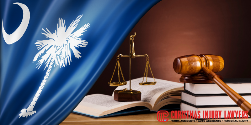 South Carolina flag with a gavel and scales of justice on an open law book,