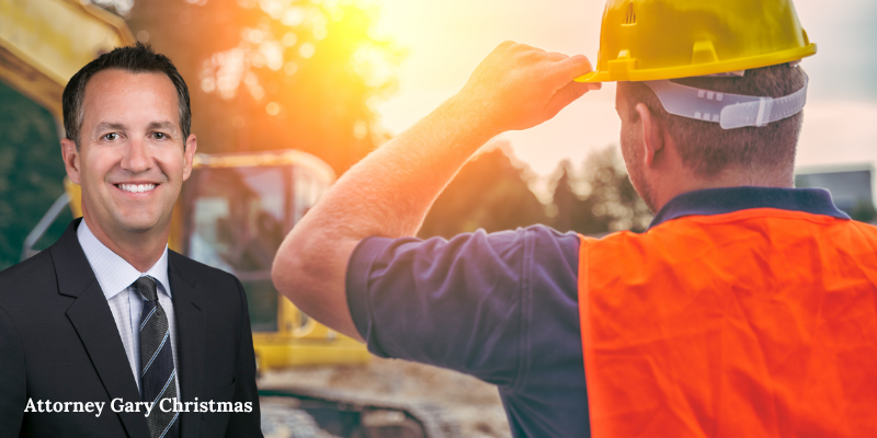 Attorney Gary Christmas with a professional smile, alongside a construction worker in a hard hat