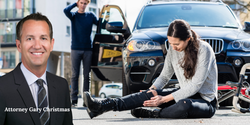 Attorney Gary Christmas alongside a woman injured in a pedestrian accident, highlighting the importance of